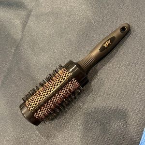 Copper hair brush.